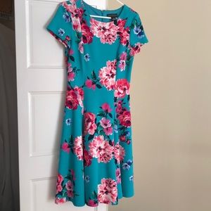 Beautiful spring fit and flare dress. Length is just below knee length.